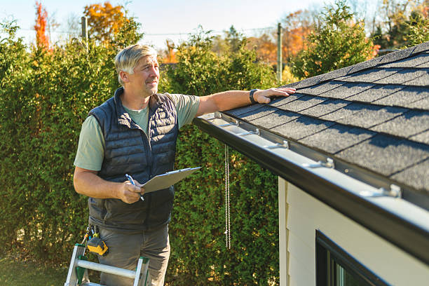 Professional Storm Damage Roof Repair technician working in Ridgeway, OH